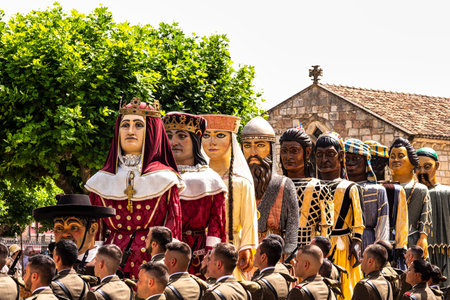 Burgos, Spain - Jun 17, 2023: Gigantes and cabezudos at Fiesta del Curpillos in Burgos, Castile and Leon, Spain. Giants and Big Heads parade is typical in festive days in Spainのeditorial素材