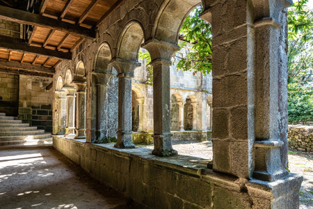 Nogueira, Spain - Jul 04, 2023: The romanesque gothic monastery of Santo Estevo de Ribas de Sil, now a National Parador at Nogueira de Ramuin, Galicia in Spainのeditorial素材
