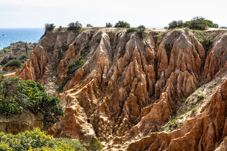 Praia da Marinha Beach among rock islets and cliffs seen from Seven Hanging Valleys Trail, Percurso...