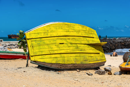 Boats at the ruined structure of the old Metal Bridge at Fortaleza in the state of Ceara, Brazil. Historic place, much sought after by touristsの写真素材