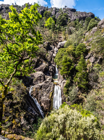 The beautiful Arado Waterfall, Cascata do Arado at the Peneda Geres National Park in northern Portugal, Europeの写真素材