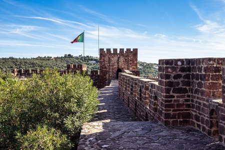 Silves Castle in the South of Portugal. A medieval fortress built by the Moorish empire caliphate in the Algarve region of Portugal.の写真素材