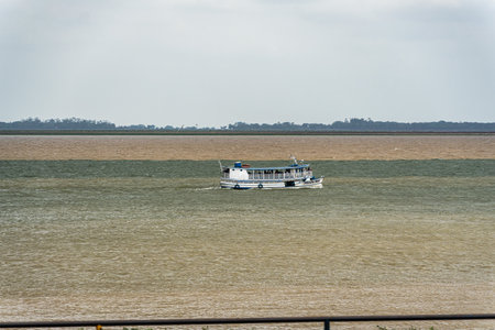 Natural phenomenon of the meeting of the blue waters of the Tapajos River and muddy of the Amazon...
