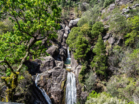 The beautiful Arado Waterfall, Cascata do Arado at the Peneda Geres National Park in northern Portugal, Europeの写真素材