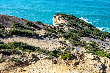 Cape Espichel in Portugal. Ribeira dos Caixeiros, southwestern end of the Setubal peninsula, Arrabida Natural Park. Jazida de Icnofosseis da Pedra da Mua, Lagosteiros Natural Monumentの写真素材
