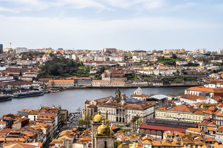 Picturesque, colorful view at old town of Porto in Portugal. Oporto, touristic Mediterranean city of culture, architecture, wine, sport and gastronomy.の写真素材