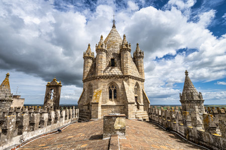 Gothic dome and roofs of Cathedral of Nossa Senhora da Assuncao in Evora. World Heritage City by...