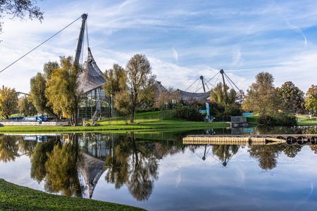 Golden autumn view in the Olympiapark in Munich, Germany. This is an Olympic Park which was constructed for the 1972 Summer Olympics in Munichの写真素材