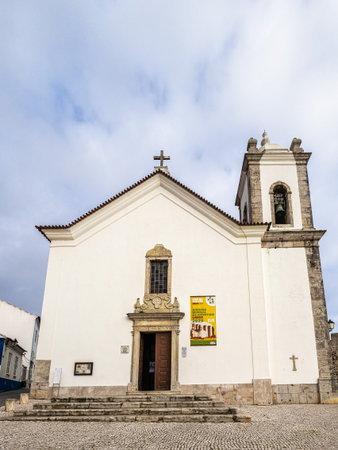 The facade of the Mother church of Sao Salvador at Sines in Portugalの写真素材
