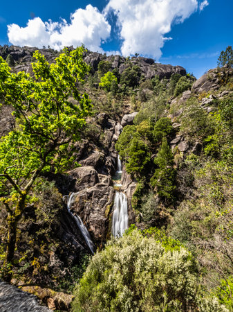 The beautiful Arado Waterfall, Cascata do Arado at the Peneda Geres National Park in northern...