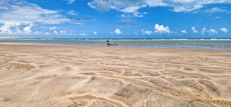 Fishermen at Canoa Quebrada Beach at Aracati in Ceara Brazil. Bay Coastline. Coast Travel. Vacations Landscape. Beach Cliffの写真素材