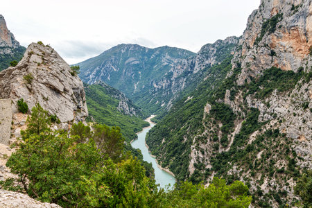 Verdon Gorge, Gorges du Verdon in French Alps, Provence, France. Amazing landscape of the famous canyon with winding turquoise-green colour river and high limestone rocksの写真素材