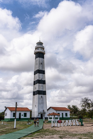 The lighthouse of Mandacaru, Barreirinhas, Maranhao, Brazil, overlooking the Preguicas River, and the Atlantic Oceanの写真素材
