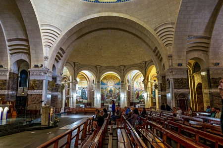 Lourdes, France - Sep 28, 2025: Interior of the Basilica in the Sanctuary of Lourdes, France. Mayor pilgrimage spot for Catholics all around the worldのeditorial素材