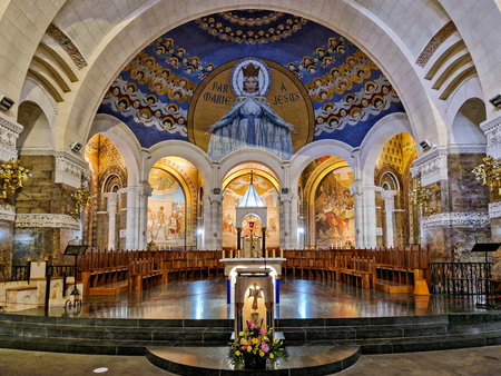 Lourdes, France - Sep 28, 2025: Interior of the Basilica in the Sanctuary of Lourdes, France. Mayor pilgrimage spot for Catholics all around the worldのeditorial素材