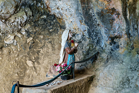 Aude, France - Sep 24, 2025: The hermitage of Saint-Antoine de Galamus, located within the gorges of Galamus, Aude, Eastern Pyrenees, Languedoc Roussillon, France in Europeのeditorial素材