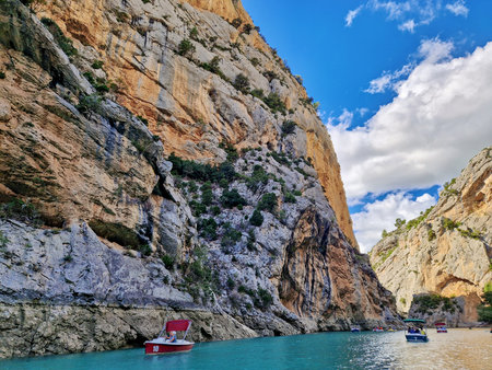 Verdon Gorge, France - Sep 22, 2025: Boat trip on turquoise water of the mountain canyon Verdon Gorge in the french Alps, Provence France. Canyon is about 25 kilometres long and up to 700 metres deep.のeditorial素材