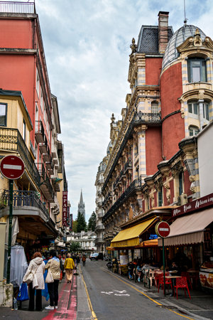Lourdes, France - Sep 28, 2025: Architectural details of the city center of Lourdes, a market town in the Pyrenees, Hautes-Pyrenees, Occitanie, southwestern France.のeditorial素材