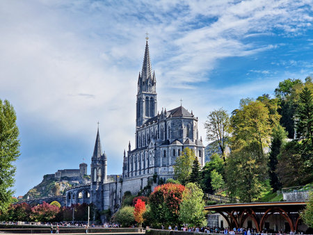 Lourdes, France - Sep 28, 2025: View of the Basilica in the Sanctuary of Lourdes, France. Mayor pilgrimage spot for Catholics all around the worldのeditorial素材