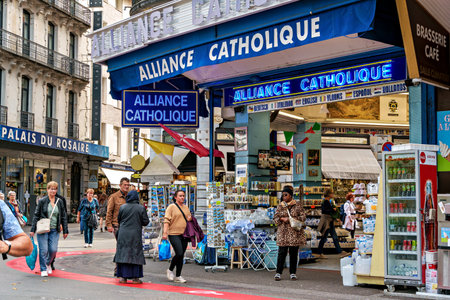 Lourdes, France - Sep 28, 2025: Architectural details of the city center of Lourdes, a market town in the Pyrenees, Hautes-Pyrenees, Occitanie, southwestern France.のeditorial素材