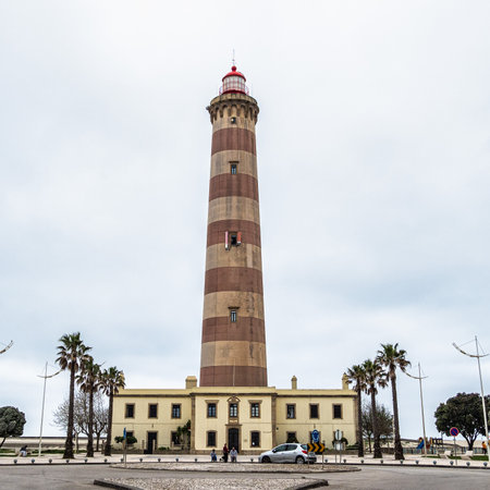 Aveiro, Portugal - Mar 19, 2025: The Farol de Aveiro. Lighthouse in the coast of Aveiro, in front of Atlantic ocean, the biggest of Portugalのeditorial素材