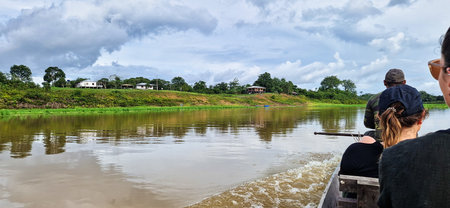 Manaus, Brazil - Jan 08, 2026: River boat trip at Parana do Mamori in the Amazon rainforest about...