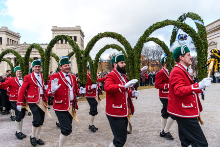 Munich, Germany - Feb 08, 2026: Traditional dance of the coopers guild in historical dresses, performed every seven years during the carnival season in Munich, Bavaria in Germanyのeditorial素材