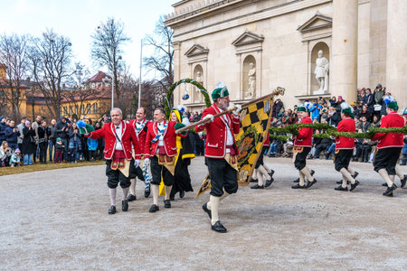 Munich, Germany - Feb 08, 2026: Traditional dance of the coopers guild in historical dresses, performed every seven years during the carnival season in Munich, Bavaria in Germanyのeditorial素材