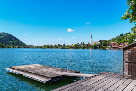 Schliersee, Germany - May 12, 2025: Beautiful hiking trail around Lake Schliersee in the bavarian alps at Schliersee, Upper Bavaria, Germany in Europeのeditorial素材