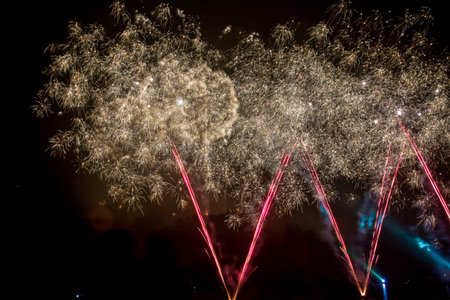 The colorful light of fireworks at Munich Olympiapark, Germany in Europeの写真素材