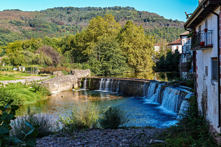 Walking through the streets of Elizondo, Navarra in Spain. Traditional Basque houses with classic...