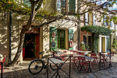 Aigues Mortes, France - Nov 05, 2025: The houses of the historic city center of Aigues-Mortes in France, Occitanie, Gard in Europe seen from above the medieval wallsのeditorial素材