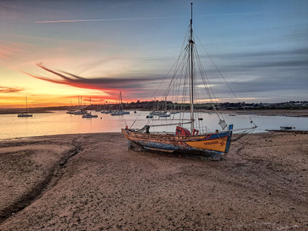 Alvor, Portugal - Feb 21, 2026: Beautiful Portuguese traditional fishing boats in the marina of Alvor town in Portugal, Europeのeditorial素材