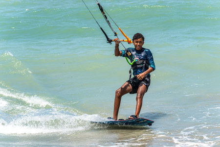 Barra Grande, Brazil - Jan 22, 2026: Kite surfing at Barra Grande beach on the coast of Piaui in...