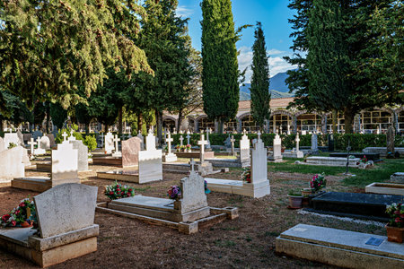 Detail on the christian graveyard with marble tombs and crosses in Jaca, Spain. Cementerio Municipal...