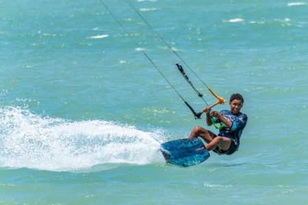 Barra Grande, Brazil - Jan 22, 2026: Kite surfing at Barra Grande beach on the coast of Piaui in...