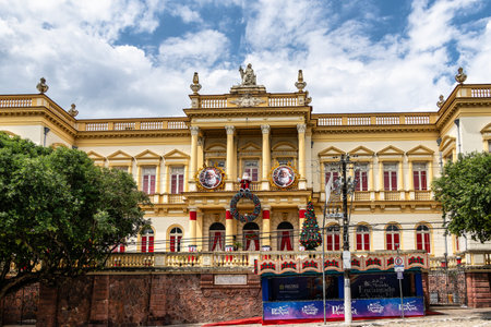 Manaus , Brazil - Dec 25, 2025: The facade of the historic yellow Palace of Justice building in central Manaus. Amazonas in Brazilのeditorial素材
