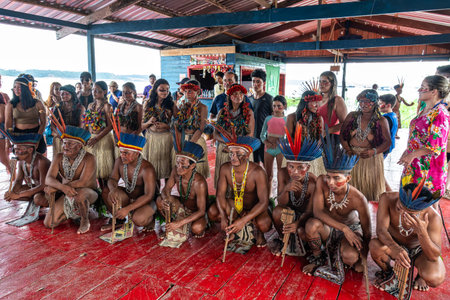 Manaus , Brazil - Dec 27, 2025: Indigenous from the Brazilian Amazon of the Dessana ethnic group presenting their culture to tourists in their community. City of Manaus, state of Amazonas, Brazilのeditorial素材