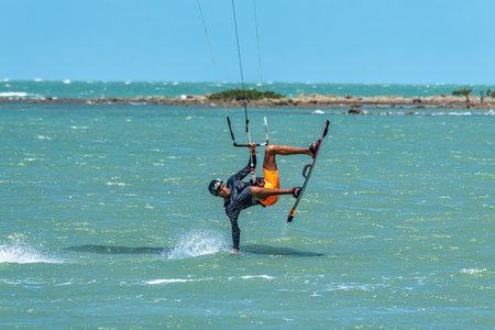Barra Grande, Brazil - Jan 22, 2026: Kite surfing at Barra Grande beach on the coast of Piaui in...
