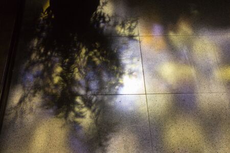 in a historical city of bavaria in south germany at summertime you see ornaments and candleholders and ceilings as well as benches and wall boards and door lock artworkの写真素材