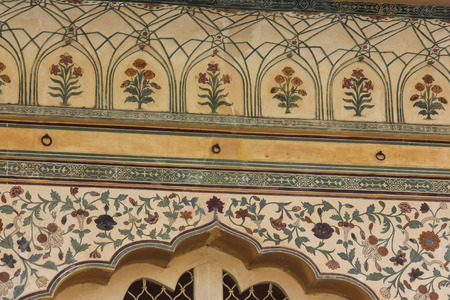 on april springtime in rajasthan india in jaipur exact views at ornaments and figurines and graphics and paintings and marmor artwork are admiring moments of historyの写真素材