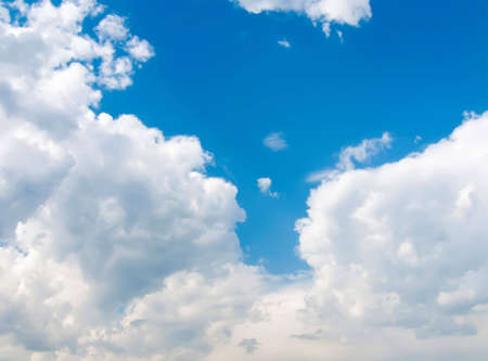 Clouds against the blue skyの写真素材