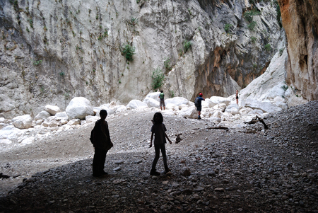 Trekkers in the Gorropu canyonの写真素材