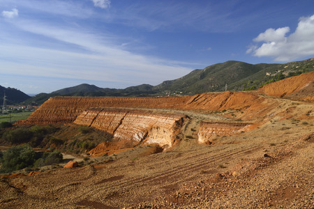 Landfill of red mud of Monteponi mineの写真素材