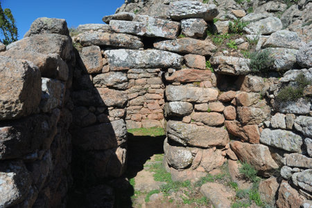 Trail to the archaeological nuragic area of Sos Nurattolos, nuragic temple at megaronの写真素材