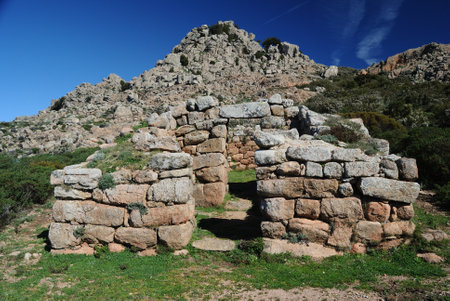 Trail to the archaeological nuragic area of Sos Nurattolos, nuragic temple at megaronの写真素材