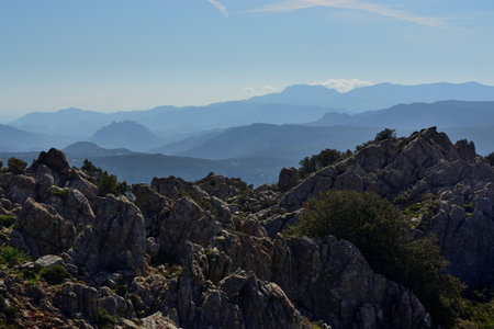 Trail to the archaeological nuragic area of Sos Nurattolos, panorama from Punta Senalongaの写真素材