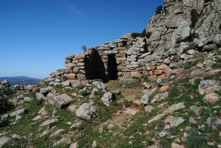 Trail to the archaeological nuragic area of Sos Nurattolos, nuragic temple at megaronの写真素材