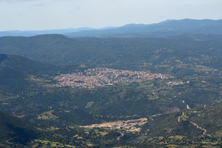Trekking to Punta Corrasi in the Supramonte of Oliena, view of Orgosolo townの写真素材