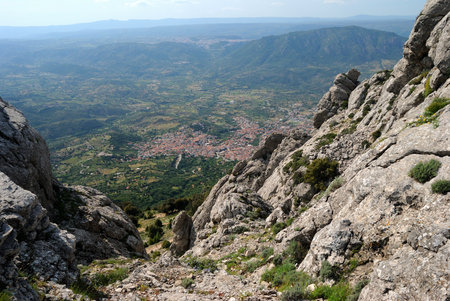 Trekking to Punta Corrasi in the Supramonte of Oliena, view of Oliena townの写真素材